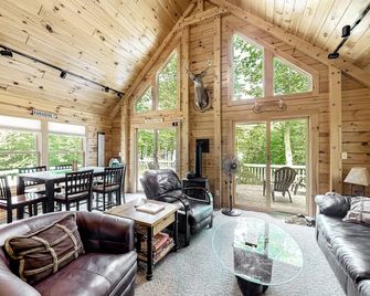 Lakefront cabin on First Roach Pond with dock, lake view & firepit- dog-friendly - Greenville - Living room
