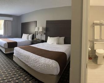 Adams Inn and Suites - Adams - Bedroom