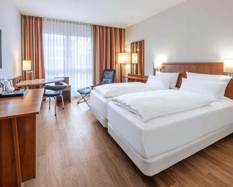 إن إتش ميونيخ إيست كونفرنس سنتر - ميونخ - غرفة نوم