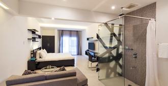 Winds Boutique Hotel - Angeles City - Yatak Odası