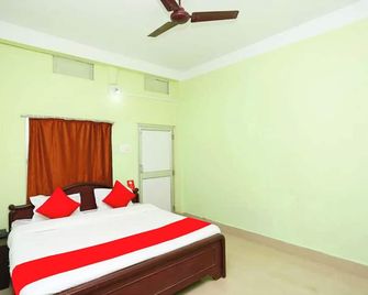 Goroomgo Somnath Rest House Puri - Near Sea Beach - Puri - Soveværelse