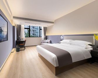 Mingquan Light bamboo Hotel - Yunfu - Bedroom