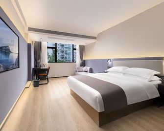 Mingquan Light bamboo Hotel - Yunfu - Bedroom