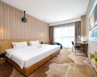 Mini Hotel - Zhuzhou - Schlafzimmer