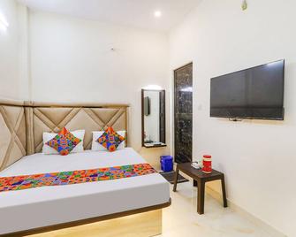 Fabexpress City Inn - Faizābād - Bedroom