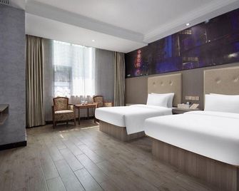 Ai Ma Hotel - צ'נגשה - חדר שינה