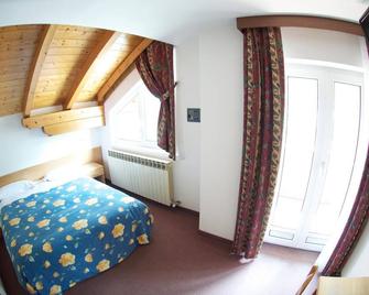 Albergo Sciatori - Vermiglio - Спальня