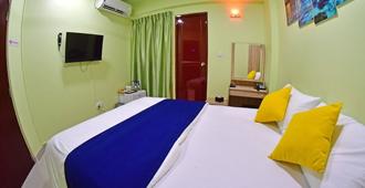 Tourist Inn - Malé - Camera da letto