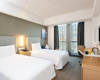 هوليداي إن اكسبرس شانغهاي جينشا - شنغهاي - غرفة نوم