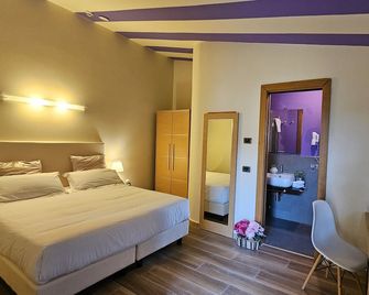 Select Executive - Florencia - Habitación