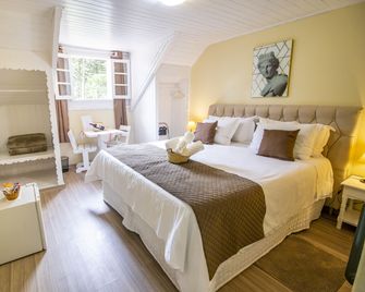 Green Village Hotel - Monte Verde - Bedroom