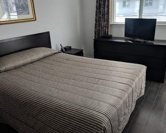 هيلتوب موتل - كينغستن - غرفة نوم
