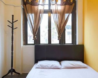 Cocoa Mews Cafe & Homestay - Hostel - George Town - Bedroom