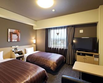 Hotel Route-Inn Fuji Chuo Koen Higashi - Fuji - Bedroom