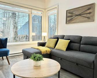 Happy Hour - Condo Water Park - Beaupre - Huiskamer