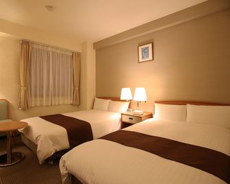 Toyooka Sky Hotel - Toyooka - Schlafzimmer