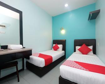 Marjan Hotel Sdn Bhd - Chukai - Schlafzimmer