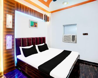 Spot On Hotel Sukoon - Tūndla - Bedroom