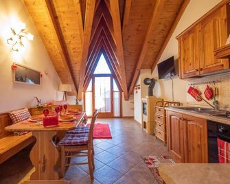 Happy Guest Apartments - Alpin Chalet Borno - Borno - Comedor
