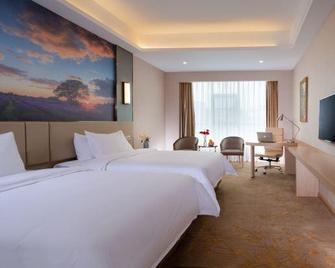 Vienna Hotel (Yiyang Heshan Xiufeng Park) - Yiyang - Chambre