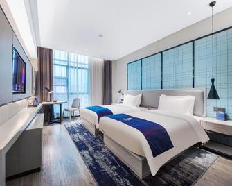 Echarm Hotel Xuzhou Suning Plaza - Xuzhou - Slaapkamer