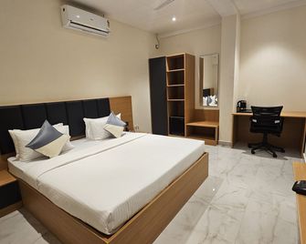 Emerald Urban Comforts - Mysore - Slaapkamer