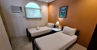 Palmas Del Mar Conference Resort Hotel - Bacolod City - Slaapkamer