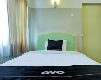 Townhouse Oak Palembang Near Jembatan Ampera - פלמבאנג - חדר שינה