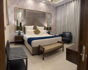 Ifq Hotel & Resort Islamabad - Islamabad - Schlafzimmer