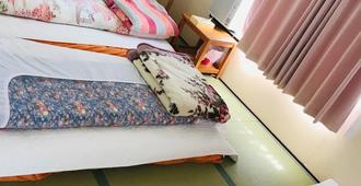 Minshuku Kaikeibo - Sennan - Bedroom