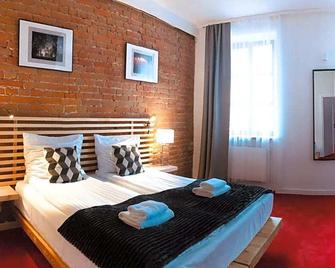 Hotel77 - Zamość - Schlafzimmer