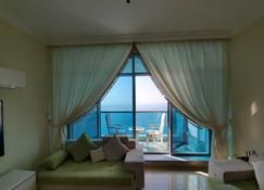 Beachfront Holiday Homes - Ajman - Living room