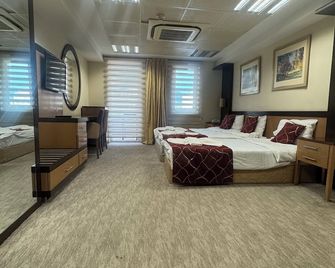 körfez otel - Edremit - Schlafzimmer