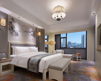 Shenzhou Mingzhu Hotel - Hengyang - Bedroom