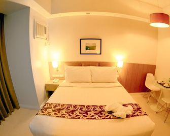 Zerenity Hotel & Suites - Cebu City - Soveværelse