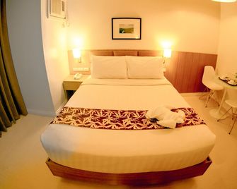 Zerenity Hotel & Suites - Cebu City - Bedroom