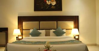 Bhawna Clarks Inn - Agra - אגרה - חדר שינה