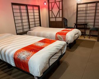 Ogano Onsen Suzaki Ryokan - Ogano - Bedroom