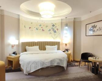 Lanling Longzhimeng Hotel - Linyi - Slaapkamer