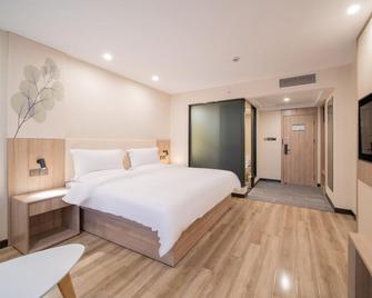 Green Tree Inn Nantong Chongchuan District Tongjing Avenue Jiaoyu Road - Nantong - Habitación