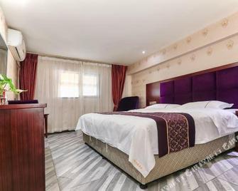 Suining Sankemili Express South Gate - Suining - Habitación