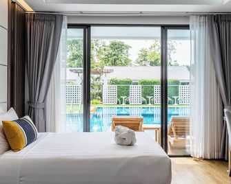 Chaolao Cabana Resort - צ'אנטאבורי - חדר שינה