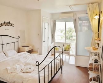 Hostellerie Avances Soiree - Татеяма - Спальня