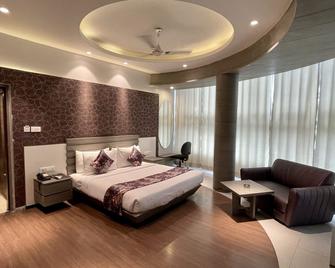 Hotel Narulas Aurrum - אמריצר - חדר שינה