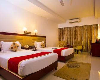 RR Inn - Tirunelveli - Bedroom