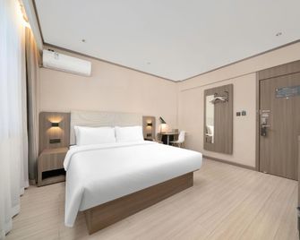 Hanting Hotel Jiamusi Guangfu Road - Jiamusi - Bedroom