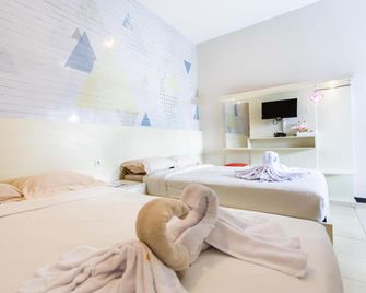 Batuque Town Villa - Batu - Habitación