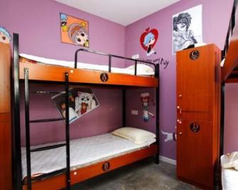 Meet int'l Youth Hostel Pichaiyuan - צ'ינגדאו - חדר שינה