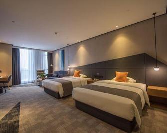 Yahe Hotel Liuzhou - Liuzhou - Schlafzimmer