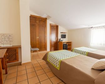 هوستال إل جالو - مربلّة - غرفة نوم